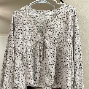 Black and white Dalmatian print long sleeve top.